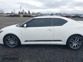 2013 Scion tC with VIN JTKJF5C70D3065601, listed as a IAAI auction lot 41272881 with 110,828 mi miles. Bid and sale history available at carsss.com. Image 14.