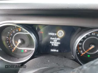 2021 Jeep Gladiator Willys с VIN 1C6HJTAG9ML559555, выставлен на аукционе IAAI как лот 41669066 с пробегом 74 799 миль миль и . История ставок и продаж доступна на DreamBid. Изображение 7.