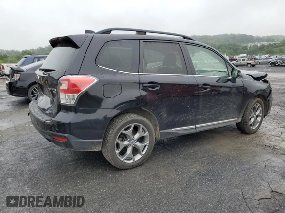 2017 Subaru Forester Touring with VIN JF2SJATC7HH437543, listed as a Copart auction lot 60866985 with 50,532 mi miles and Salvage title. Bid and sale history available at DreamBid. Image 3.