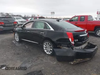 2015 Cadillac XTS Luxury with VIN 2G61M5S38F9138545, listed as a IAAI auction lot 41690696 with 136,460 mi miles and . Bid and sale history available at DreamBid. Image 3.