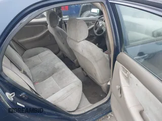 2004 Toyota Corolla CE with VIN 2T1BR32E44C261569, listed as a IAAI auction lot 42013805 with 299,999 mi miles and . Bid and sale history available at DreamBid. Image 8.