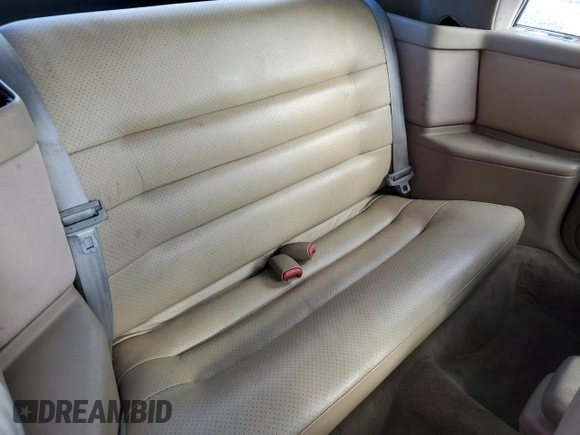 1994 Chrysler LeBaron z VIN 1C3EU4530RF259672, wystawiony jako Copart lot #80346444 z przebiegiem Nie podano mil oraz Szkody całkowita. Historia ofert i sprzedaży dostępna na DreamBid. Obrazek 10.