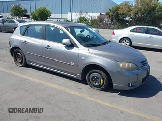 2005 Mazda 3 s with VIN JM1BK343751237434, listed as a IAAI auction lot 42876724 with 258,658 mi miles and . Bid and sale history available at DreamBid. Image 1.