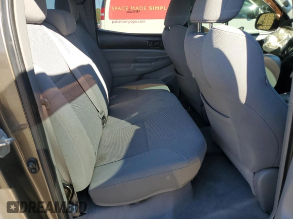 2010 Toyota Tacoma PreRunner with VIN 3TMKU4HN3AM025218, listed as a Copart auction lot 87600035 with 92,605 mi miles and Salvage title. Bid and sale history available at DreamBid. Image 10.