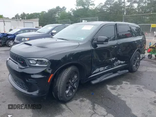 2022 Dodge Durango R/T Plus with VIN 1C4SDJCT8NC187003, listed as a IAAI auction lot 42409749 with 56,055 mi miles and . Bid and sale history available at DreamBid. Image 2.