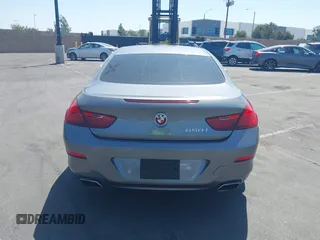 2013 BMW 6 Series 650i with VIN WBAYM9C53DDW20145, listed as a IAAI auction lot 42039618 with 66,684 mi miles and . Bid and sale history available at carsss.com. Image 16.
