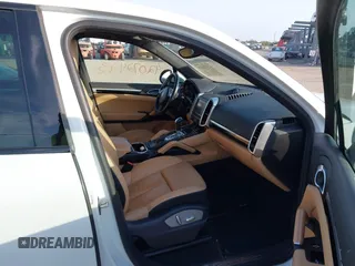 2014 Porsche Cayenne with VIN WP1AA2A23ELA97180, listed as a IAAI auction lot 42072423 with 143,374 mi miles and . Bid and sale history available at DreamBid. Image 5.