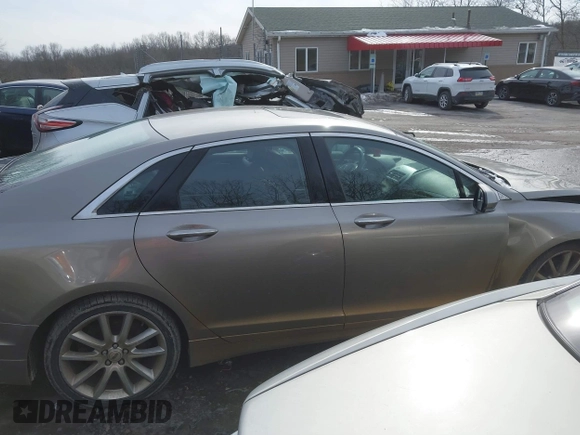 2015 Lincoln MKZ z VIN 3LN6L2JK4FR610596, wystawiony jako IAAI lot #41443285 z przebiegiem 114 363 mil mil oraz . Historia ofert i sprzedaży dostępna na DreamBid. Obrazek 13.