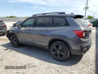 2021 Honda Passport Elite with VIN 5FNYF8H08MB014398, listed as a Copart auction lot 50499375 with 52,550 mi miles and Salvage Title. Bid and sale history available at carsss.com. Image 2.