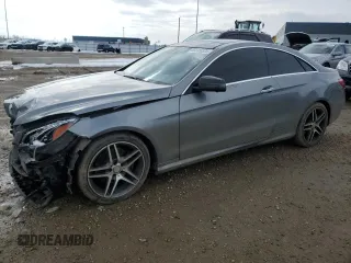 2014 Mercedes-Benz E 350 with VIN WDDKJ8JB9EF272304, listed as a Copart auction lot 49345525 with 126,915 mi miles and Salvage title. Bid and sale history available at DreamBid. Image 1.