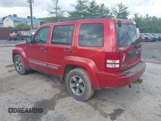 2008 Jeep Liberty Sport with VIN 1J8GN28K78W147239, listed as a IAAI auction lot 42184293 with 182,736 mi miles. Bid and sale history available at carsss.com. Image 3.