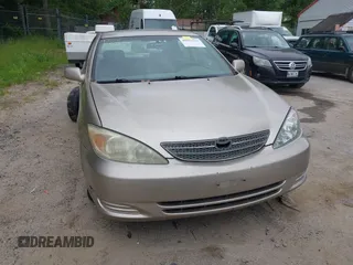 2004 Toyota Camry LE with VIN 4T1BE32K14U271900, listed as a IAAI auction lot 42533723 with 147,177 mi miles and . Bid and sale history available at DreamBid. Image 13.