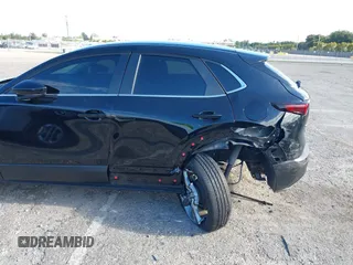 2023 Mazda CX-30 S Select with VIN 3MVDMBBM9PM508958, listed as a IAAI auction lot 42009029 with 21,219 mi miles and . Bid and sale history available at DreamBid. Image 6.