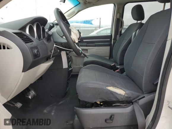 2008 Dodge Grand Caravan SXT with VIN 2D8HN54P48R694834, listed as a Copart auction lot 42095275 with 121,238 mi miles and Salvage Title. Bid and sale history available at DreamBid. Image 7.