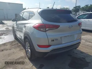2016 Hyundai Tucson Limited with VIN KM8J33A25GU227907, listed as a IAAI auction lot 42211605 with 142,578 mi miles. Bid and sale history available at carsss.com. Image 3.
