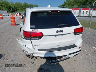 2021 Jeep Grand Cherokee Overland with VIN 1C4RJFCG3MC502165, listed as a IAAI auction lot 42404863 with 100,197 mi miles and . Bid and sale history available at DreamBid. Image 16.