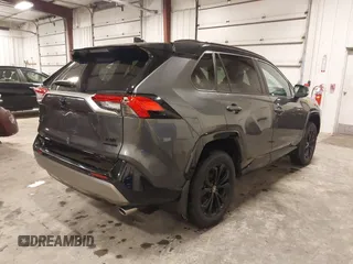 2023 Toyota RAV4 Hybrid XSE with VIN 4T3E6RFV7PU124140, listed as a IAAI auction lot 42201073 with 50,942 mi miles and . Bid and sale history available at DreamBid. Image 4.