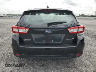 2018 Subaru Impreza with VIN 4S3GTAF65J1751579, listed as a Copart auction lot 61690535 with 77,316 mi miles and Salvage title. Bid and sale history available at DreamBid. Image 6.