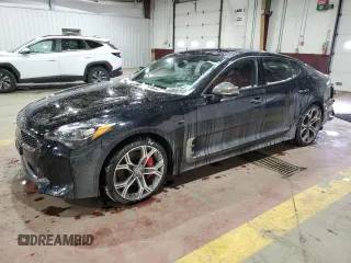 2021 Kia Stinger GT1 with VIN KNAE45LC5M6089254, listed as a Copart auction lot 88272305 with 74,818 mi miles and Salvage Title. Bid and sale history available at carsss.com. Image 1.