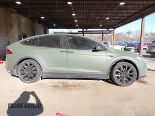 2020 Tesla Model X Long Range with VIN 5YJXCDE24LF272242, listed as a IAAI auction lot 41275226 with 103,731 mi miles. Bid and sale history available at carsss.com. Image 13.