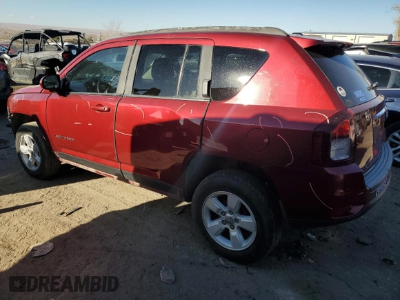 2016 Jeep Compass Latitude with VIN 1C4NJCEB2GD749061, listed as a Copart auction lot 83071564 with 127,616 mi miles and Salvage Title. Bid and sale history available at carsss.com. Image 2.