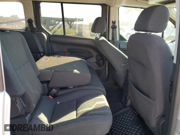 2018 Ford Transit Connect XLT z VIN NM0GS9F78J1365522, wystawiony jako Copart lot #75529724 z przebiegiem 65 939 mil mil oraz Szkoda całkowita • Salvage title. Historia ofert i sprzedaży dostępna na DreamBid. Obrazek 12.