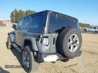 2018 Jeep Wrangler Unlimited Sahara with VIN 1C4HJXEN9JW303094, listed as a IAAI auction lot 41491564 with 66,128 mi miles and . Bid and sale history available at DreamBid. Image 3.