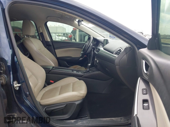 2017 Mazda Mazda6 Touring with VIN JM1GL1V54H1107722, listed as a IAAI auction lot 41521257 with 142,129 mi miles. Bid and sale history available at carsss.com. Image 5.