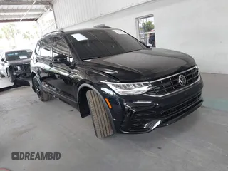 2024 Volkswagen Tiguan SE R-Line Black z VIN 3VVCB7AX4RM106944, wystawiony jako IAAI lot #42121362 z przebiegiem 11 777 mil mil oraz . Historia ofert i sprzedaży dostępna na DreamBid. Obrazek 14.