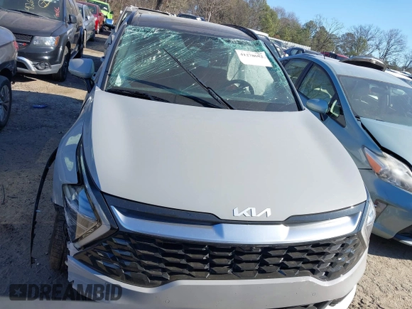 2023 Kia Sportage SX-Prestige z VIN 5XYK53AF7PG133325, wystawiony jako IAAI lot #41278082 z przebiegiem 26 361 mil mil oraz . Historia ofert i sprzedaży dostępna na DreamBid. Obrazek 12.