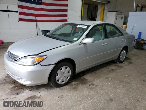 2003 Toyota Camry LE with VIN 4T1BE32K33U710903, listed as a Copart auction lot 56976585 with 157,444 mi miles and Clean Title. Bid and sale history available at DreamBid. Image 1.
