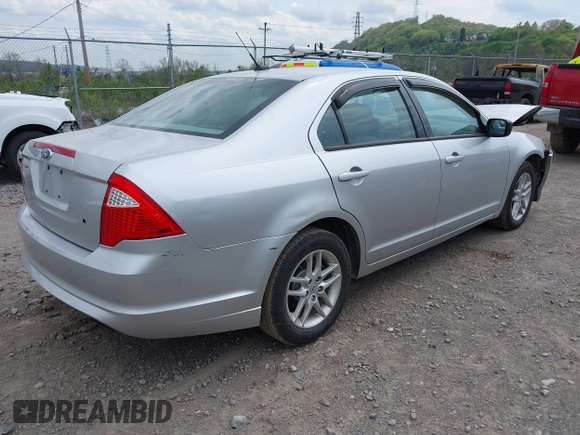 2012 Ford Fusion S with VIN 3FAHP0GA3CR127140, listed as a IAAI auction lot 42127986 with 83,447 mi miles and . Bid and sale history available at carsss.com. Image 4.