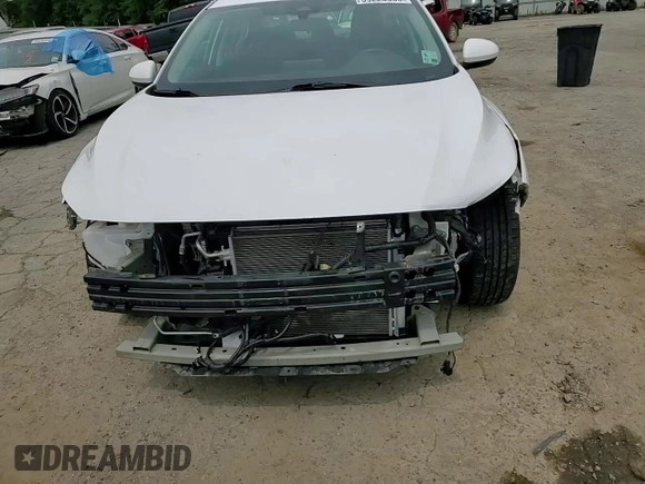 2021 Nissan Sentra SV z VIN 3N1AB8CV3MY280709, wystawiony jako Copart lot #59220035 z przebiegiem 60 936 mil mil oraz Szkoda całkowita • Salvage title. Historia ofert i sprzedaży dostępna na DreamBid. Obrazek 14.