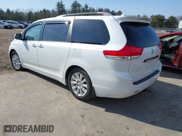 2011 Toyota Sienna XLE AAS with VIN 5TDYK3DC7BS054012, listed as a IAAI auction lot 41752182 with 123,226 mi miles and . Bid and sale history available at DreamBid. Image 3.
