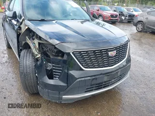 2020 Cadillac XT4 AWD Premium Luxury z VIN 1GYFZDR45LF049638, wystawiony jako IAAI lot #42216996 z przebiegiem 82 760 mil mil oraz . Historia ofert i sprzedaży dostępna na DreamBid. Obrazek 20.