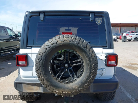 2020 Jeep Wrangler Unlimited Sport with VIN 1C4HJXDG0LW174393, listed as a IAAI auction lot 41575040 with 68,418 mi miles and . Bid and sale history available at DreamBid. Image 17.