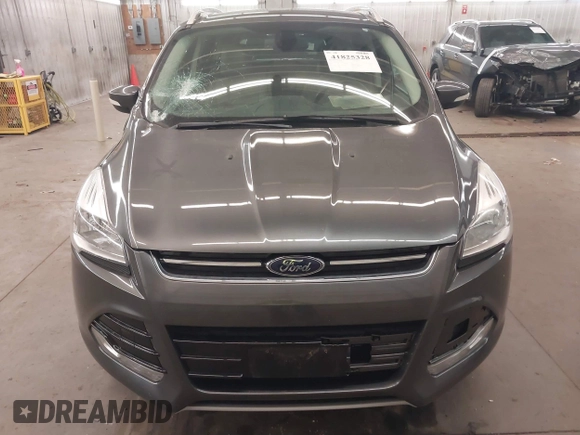2015 Ford Escape Titanium with VIN 1FMCU9J96FUA43337, listed as a IAAI auction lot 41825328 with 149,639 mi miles and . Bid and sale history available at DreamBid. Image 6.