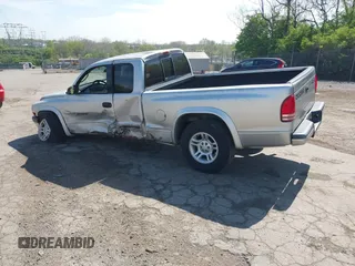 2001 Dodge Dakota SLT with VIN 1B7GG22XX1S348751, listed as a IAAI auction lot 42077395 with 148,034 mi miles and . Bid and sale history available at carsss.com. Image 3.