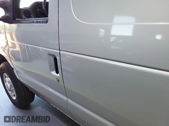 2013 Ford Econoline Cargo with VIN 1FTNS2EL5DDA38031, listed as a IAAI auction lot 42731967 with 116,056 mi miles and . Bid and sale history available at DreamBid. Image 21.