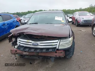 2009 Ford Taurus Limited z VIN 1FAHP25W69G100251, wystawiony jako IAAI lot #42289443 z przebiegiem 187 300 mil mil oraz . Historia ofert i sprzedaży dostępna na DreamBid. Obrazek 6.