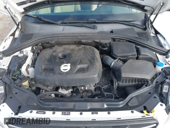 2015 Volvo XC60 T5 Drive-E Premier z VIN YV440MDB5F2610281, wystawiony jako IAAI lot #41479979 z przebiegiem 124 841 mil mil oraz . Historia ofert i sprzedaży dostępna na DreamBid. Obrazek 10.