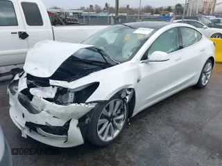 2020 Tesla Model 3 Standard Range Plus with VIN 5YJ3E1EA0LF741311, listed as a IAAI auction lot 41581931 with 43,284 mi miles. Bid and sale history available at carsss.com. Image 20.