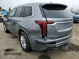2023 Cadillac XT6 FWD Luxury z VIN 1GYKPAR47PZ147139, wystawiony jako Copart lot #50783595 z przebiegiem 27 684 mil mil oraz Szkoda całkowita • Salvage title. Historia ofert i sprzedaży dostępna na DreamBid. Obrazek 2.