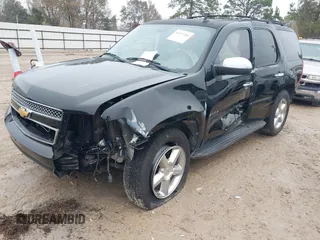 2014 Chevrolet Tahoe LT z VIN 1GNSCBE04ER143872, wystawiony jako IAAI lot #41377204 z przebiegiem 119 533 mil mil oraz . Historia ofert i sprzedaży dostępna na DreamBid. Obrazek 2.