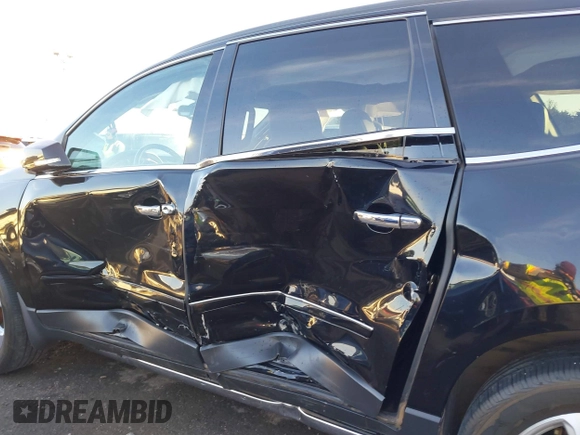 2016 Chevrolet Traverse LTZ z VIN 1GNKRJKD3GJ245438, wystawiony jako IAAI lot #41010372 z przebiegiem 115 264 mil mil oraz . Historia ofert i sprzedaży dostępna na DreamBid. Obrazek 6.