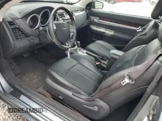 2010 Chrysler Sebring Limited z VIN 1C3BC6EV5AN144868, wystawiony jako Copart lot #66549774 z przebiegiem 106 602 mil mil oraz Szkoda całkowita • Salvage title. Historia ofert i sprzedaży dostępna na DreamBid. Obrazek 7.