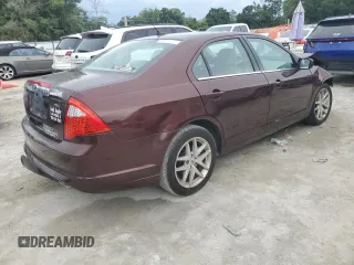 2012 Ford Fusion SEL z VIN 3FAHP0JA5CR184593, wystawiony jako Copart lot #61647265 z przebiegiem 127 720 mil mil oraz Szkoda całkowita • Salvage title. Historia ofert i sprzedaży dostępna na DreamBid. Obrazek 3.