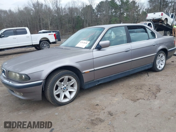 1998 BMW 7 Series 740il with VIN WBAGJ8323WDM23239, listed as a IAAI auction lot 41512630 with 221,673 mi miles. Bid and sale history available at carsss.com. Image 2.