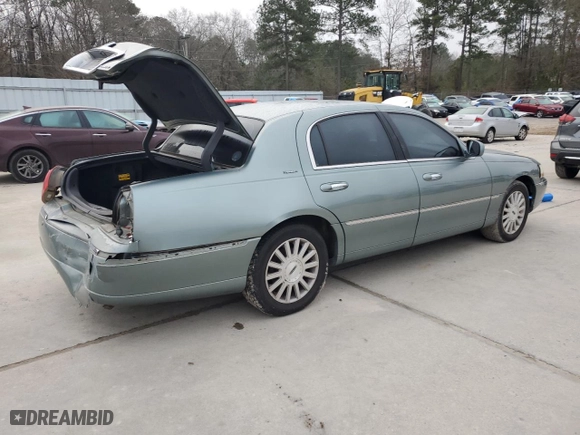 2004 Lincoln Town Car Signature with VIN 1LNHM81W34Y607067, listed as a Copart auction lot 42413965 with 106,973 mi miles and Salvage Title. Bid and sale history available at carsss.com. Image 3.