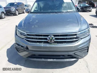 2023 Volkswagen Tiguan SE with VIN 3VVNB7AX5PM064693, listed as a IAAI auction lot 42033011 with 38,220 mi miles. Bid and sale history available at carsss.com. Image 12.